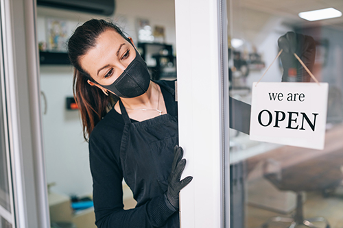 businesswoman opening shop